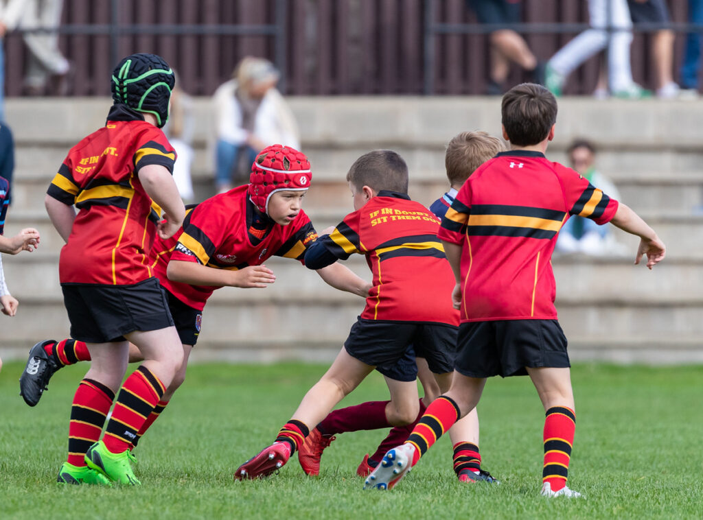 Kids playing rugby